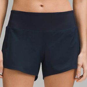 Lulu Lemon Speed Up Mid-Rise Lined Short 4" in Navy (size 10)